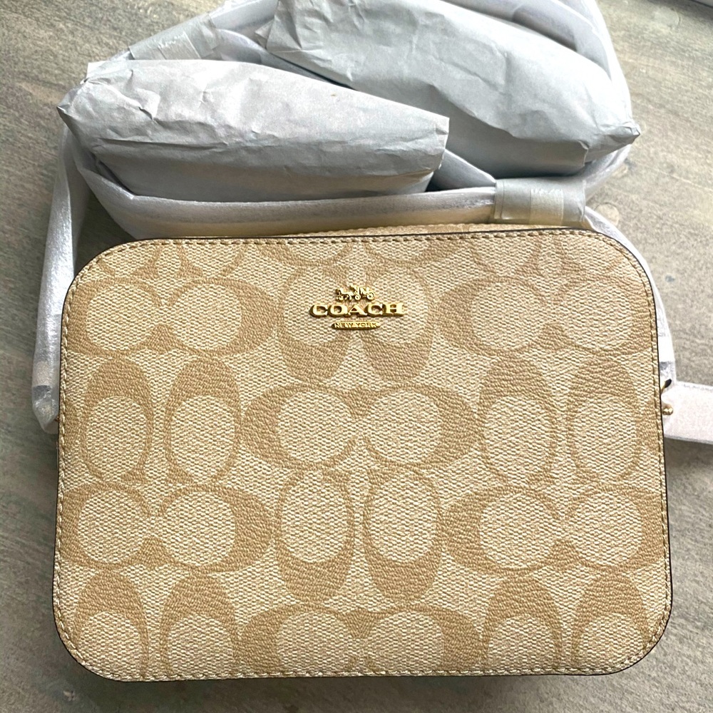 Mini Camera bag in Signature Canvas.